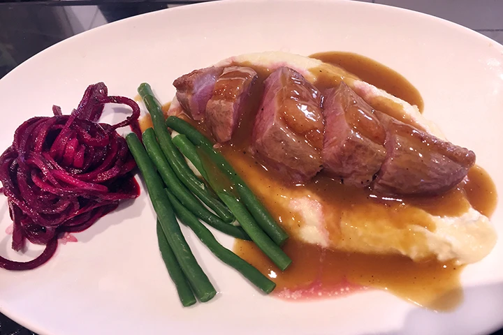 Duck with celeriac and orange sauce