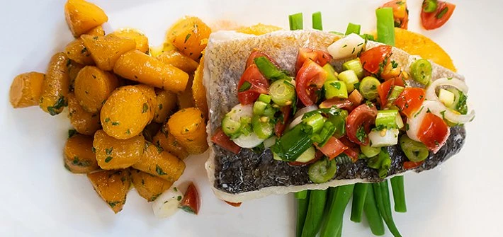 Hake with glazed carrots, green beans and tomato salsa