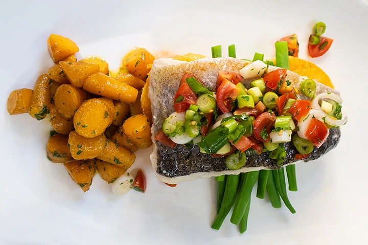 Hake with glazed carrots, green beans and tomato salsa