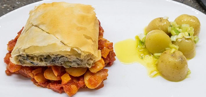 Mushroom strudel with butter beans in tomato sauce