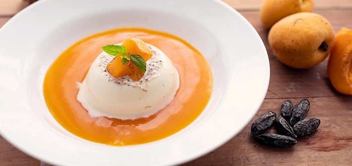 Tonka bean panna cotta with apricot coulis